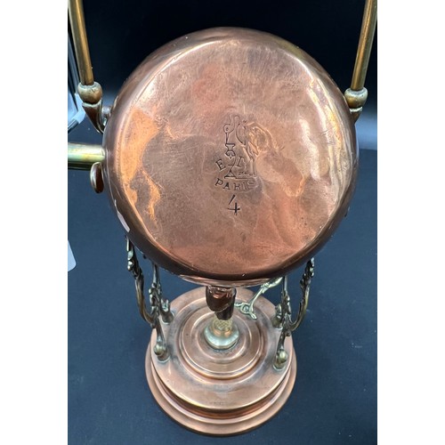 631 - A late 19thC French copper and brass coffee maker together with a 19thC copper tea caddy with recumb... 