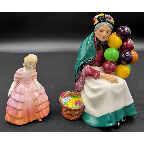 146 - Royal Doulton figurines 'The Old Balloon Seller' HN 1315 and 'Rose' HN1368.