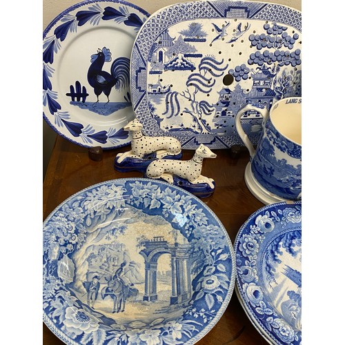 152 - A quantity of 19th and 20thC blue and white ceramics to include drainer 33 cm, square dish, Copeland... 