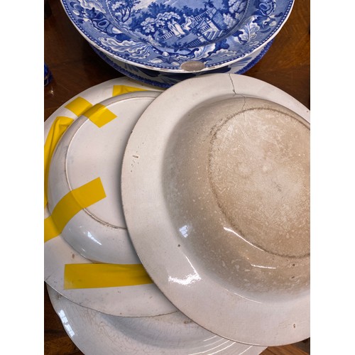 152 - A quantity of 19th and 20thC blue and white ceramics to include drainer 33 cm, square dish, Copeland... 