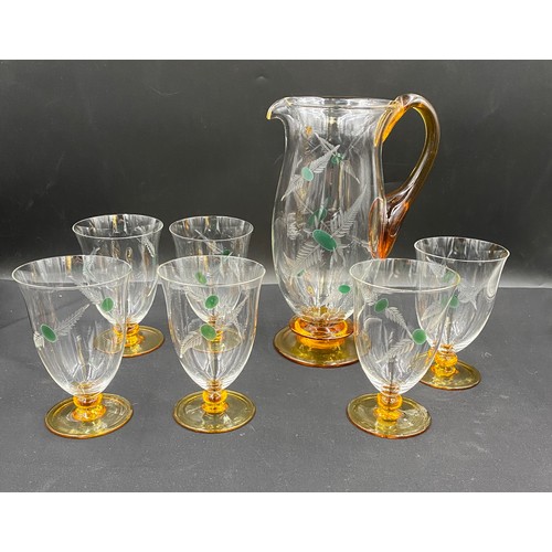 321 - A water set comprising jug and 6 glasses with amber bases and amber handle, etched leaf pattern. Jug... 