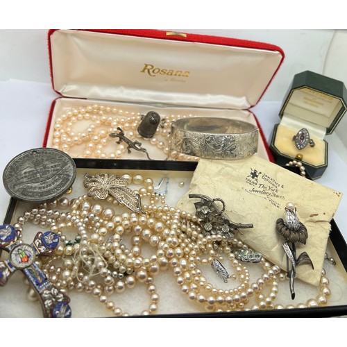 505 - Costume jewellery to include hallmarked silver bangle, brooch, pearls, general nursing council badge... 