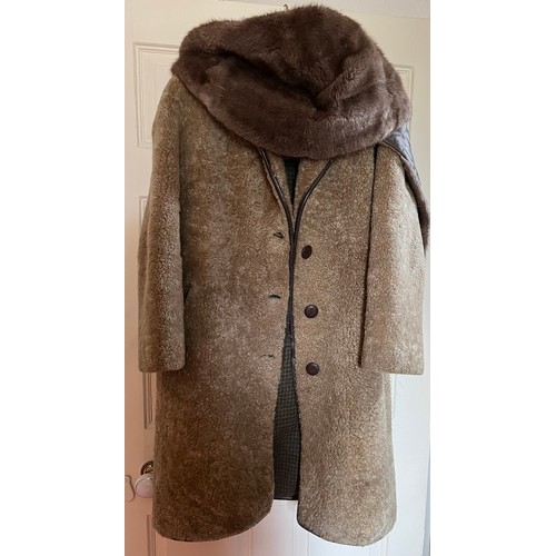 507 - A vintage sheepskin coat and fur stole with leather trim.