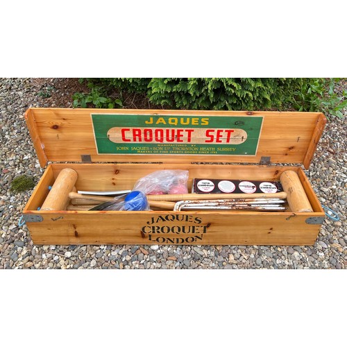 753 - A boxed Jaques Croquet set. 107 x 27cm.