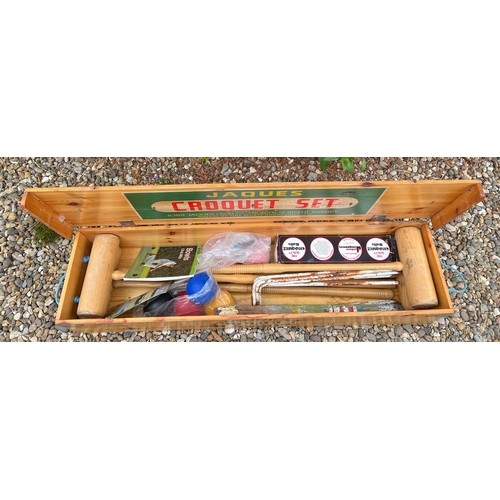 753 - A boxed Jaques Croquet set. 107 x 27cm.