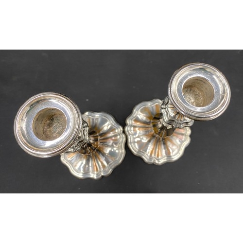 527 - A pair of good quality silver plated candlestick holders. Detachable sconces. 23.5cm to top of sconc... 