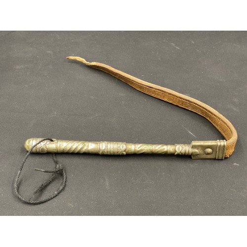 797 - A white metal handled leather whip.