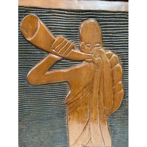 798 - A carved picture from a Wawa tree carved by an Ashanti craftsman, figure depicts a horn blower, 1 of... 