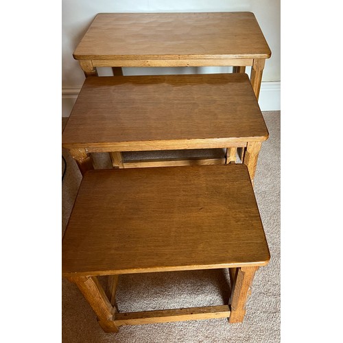 788 - A nest of 3 Robert 'Mouseman' Thompson tables with adzed tops. Largest 61 x 38 x 47cm h.