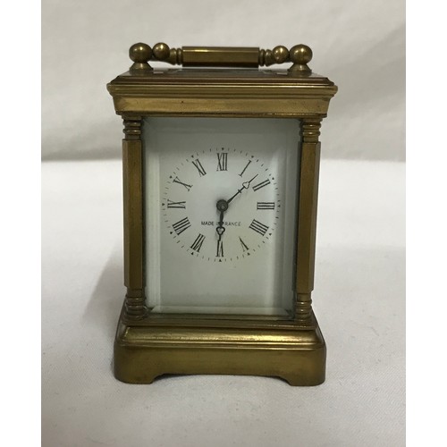 842 - Small brass, French carriage clock, for repair, has key 8.5cms h x 6cms w.