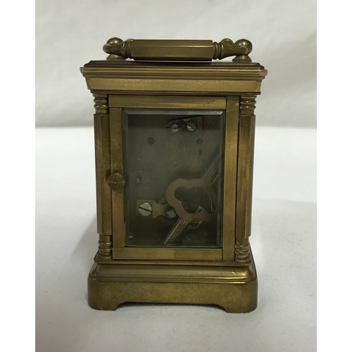 842 - Small brass, French carriage clock, for repair, has key 8.5cms h x 6cms w.