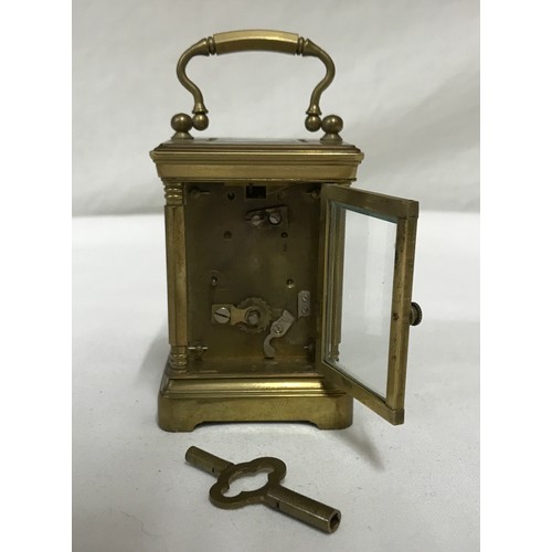 842 - Small brass, French carriage clock, for repair, has key 8.5cms h x 6cms w.