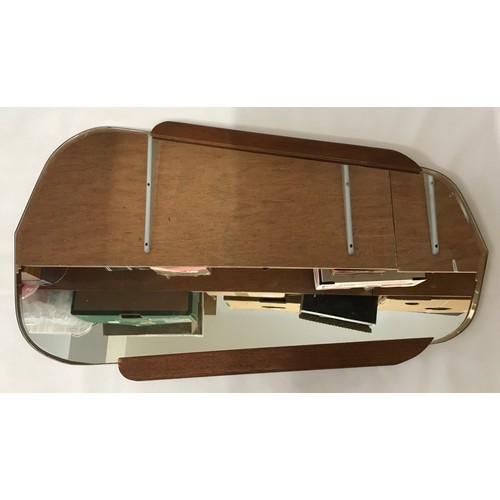 1358 - 1969 Clark Eaton Teak framed floating glass wall mirror, labels to the back 57cms h x 33cms w.