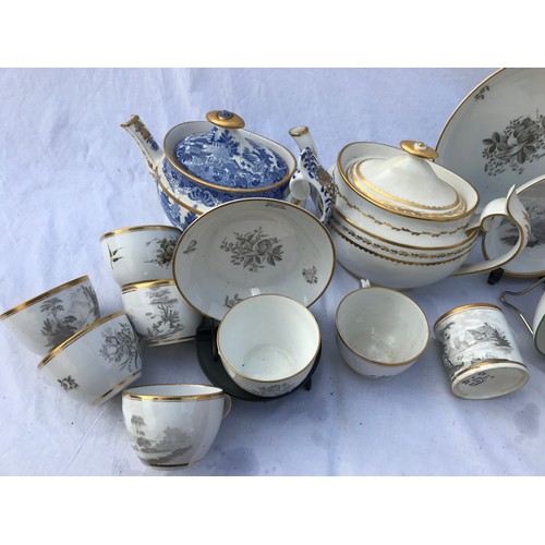 211 - A collection of early 19thC bat print cups, saucers and teapot with 2 other early 19thC teapots.