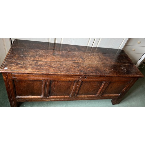 1302 - An 18th C Oak Kist with four panels to front 144cm w x 51cm d x 62cm h.