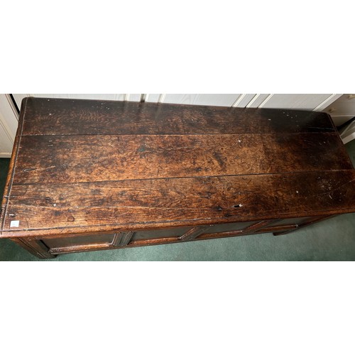 1302 - An 18th C Oak Kist with four panels to front 144cm w x 51cm d x 62cm h.