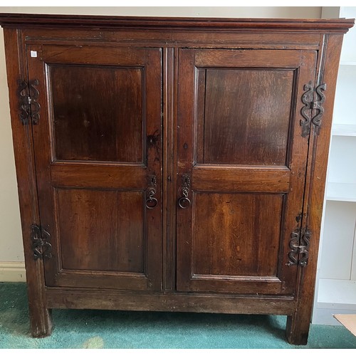 1303 - An 18th C Oak two door cupboard with shelved interior 127cm w x 42c d x 139cm h