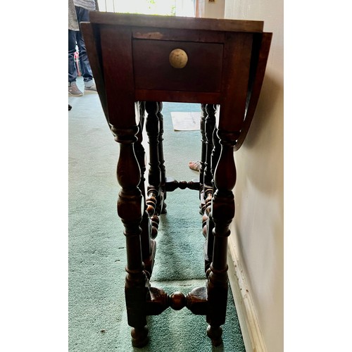 1305 - An 18th C oak gateleg table with drawer to one end 80cm x 70 cm open and 70cm x 27cm closed