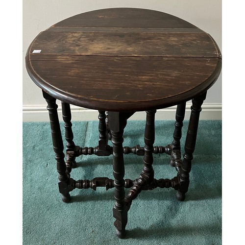 1306 - An oak gateleg table 75cm x 62cm open 62cm x 52cm closed