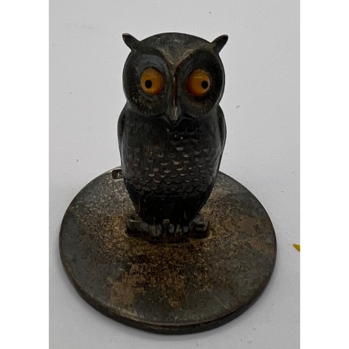 611 - A silver novelty owl menu card holder with orange glass eyes by Sampson Mordan & Co Reg 433091 Chest... 