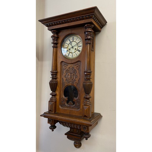 844 - A late 19thC Vienna wall clock, spring driven 8 day movement, striking on a gong. 113 h x 51 w x 25.... 