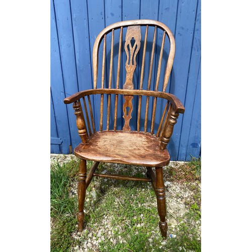 1311 - A 20thC Windsor chair. 107cm h.