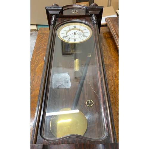 846 - Single weight Vienna Wall Clock measuring 97cm h x 33cm w x 15cm d. Has key.