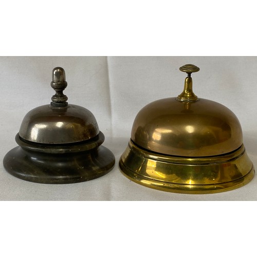 634 - Two counter top bells, one brass push down and one metal on onyx base with twist mechanism to top.