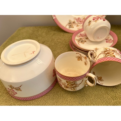 232 - A 19thC part tea service to include 2 large plates, 12 tea plates, 4 saucers, slop bowl and 6 cups.