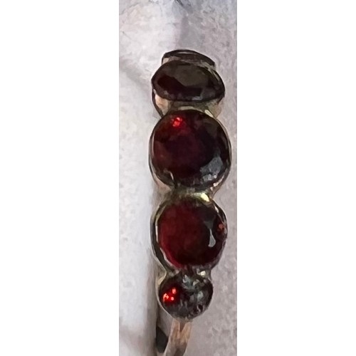 388 - Georgian armandine garnet ring, wrapped gold shank. Size M.