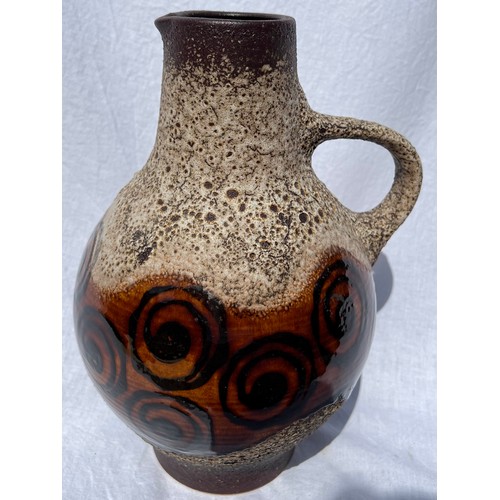 233 - A German mid century pottery jug. 31cm h.