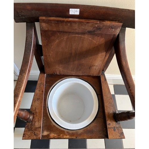 1320 - A 19thC mahogany commode, the seat lifting to reveal enamel pan and lid.