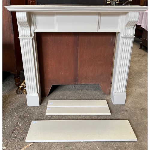 1327 - A modern fire surround and insert with stone insert. Surround external 128.5 w x 24 d x 114cm h. Int... 