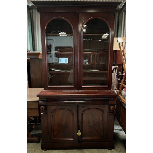 1331 - A 19thC mahogany bookcase, 2 glazed doors above 2 solid doors. 112 w x 48 d x 221cm h.