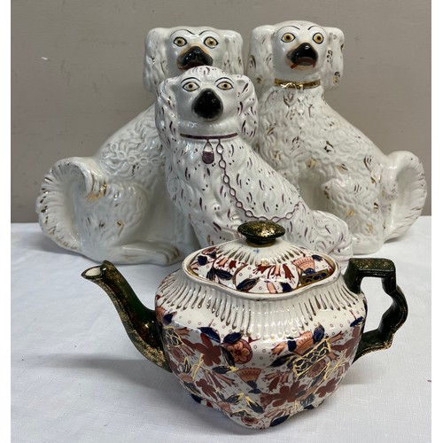 236 - 19thC ceramics including 3 Staffordshire dogs, a pair 32cm h, a single dog and a teapot.