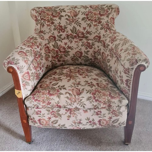 1339 - An Edwardian upholstered floral bedroom chair with mahogany and inlay to arms. 79 h x 75 w x 75cm d.