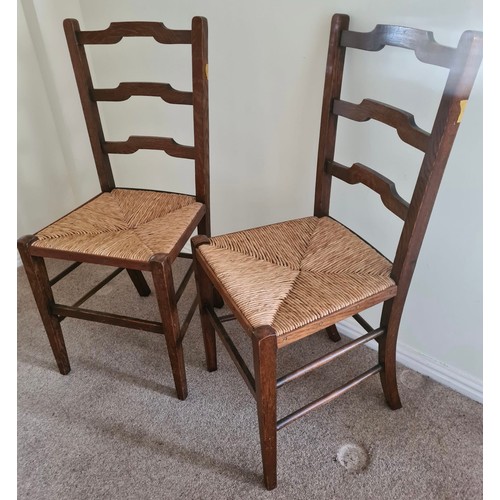 1346 - A pair of rush seated chairs. 86 h x  38 w x 36cm d.