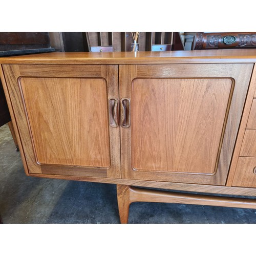 1348 - A 1974 E-Gomme G-Plan Fresco teak sideboard. 79 h x 214 w x 46cm d.