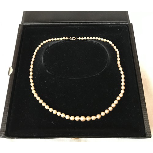 332A - A single strand of 75 cultured pearls graduating in diameter from approx. 6.5-7mm at the centre fron... 