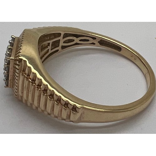 367 - A 9ct gold ring set with a square of diamonds and decoration to the shank. Size T, weight 4.3gm.