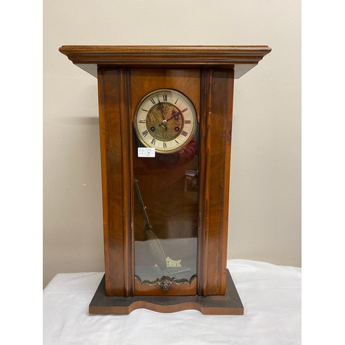 839 - A Vienna wall clock with Art Nouveau decoration to pendulum. 58cm h.