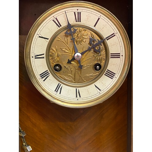 839 - A Vienna wall clock with Art Nouveau decoration to pendulum. 58cm h.