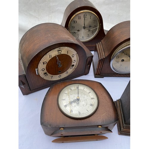 822 - Seven wooden mantel clocks with movements. Spares/repairs.