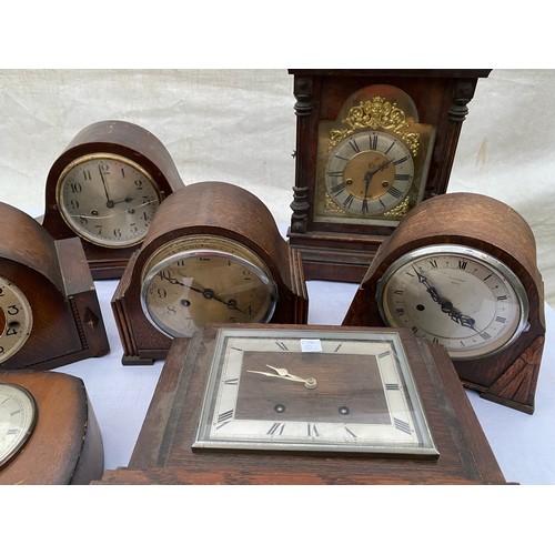 822 - Seven wooden mantel clocks with movements. Spares/repairs.