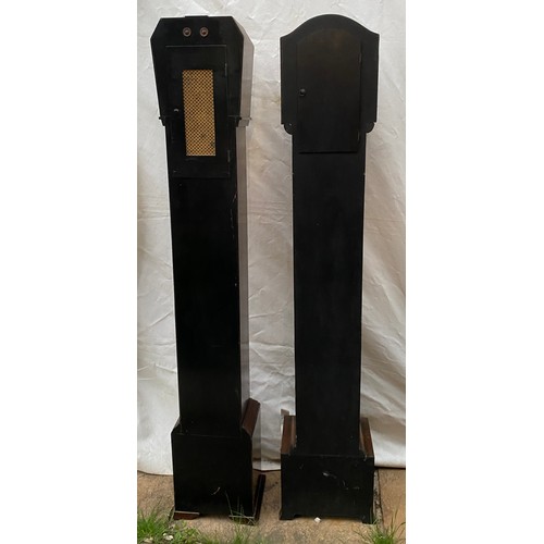 824 - Two wooden grandmother clocks believed to be in working order both 140cms high x 18cms deep one 27cm... 