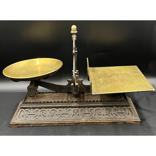 785A - Mid 19thC cast iron and brass, Parnell of Bristol shop scales with original dishes together with iro... 