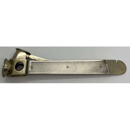 834A - A hallmarked silver cigar cutter with engine turned decoration, Birmingham 1959, maker possibly Will... 