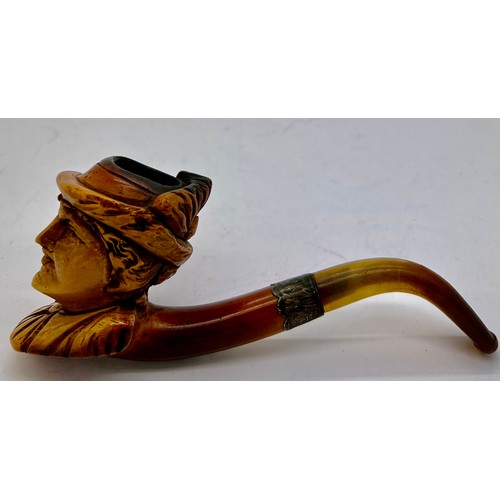 851A - A well patinated meerschaum pipe with figural female head, amber mouth piece and hallmarked engraved... 