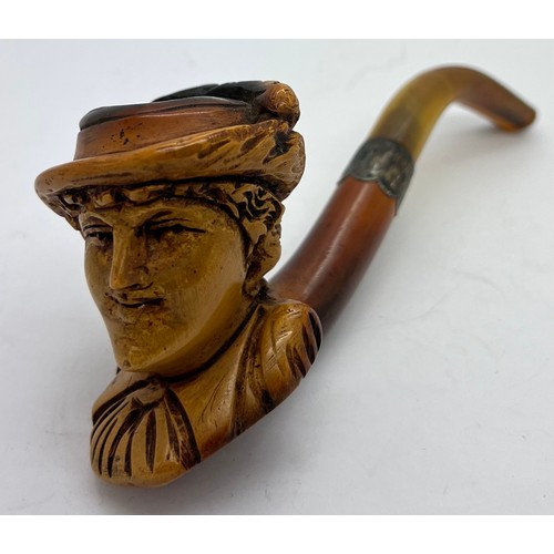 851A - A well patinated meerschaum pipe with figural female head, amber mouth piece and hallmarked engraved... 