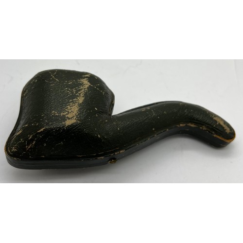 851A - A well patinated meerschaum pipe with figural female head, amber mouth piece and hallmarked engraved... 